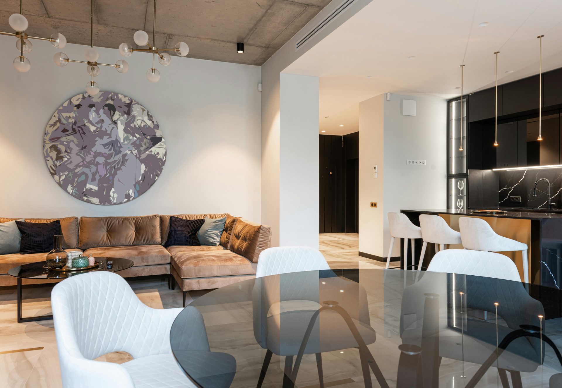 Spacious modern living room with chic decor and open kitchen setup. Perfect for interior design inspiration.