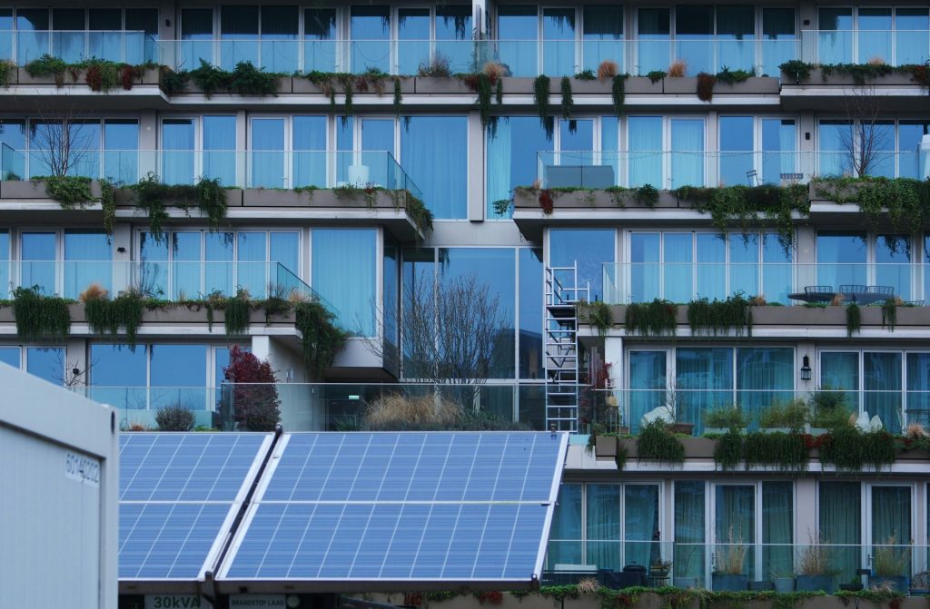 a building with a bunch of windows and a ladder